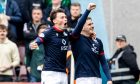 Ronan Hale celebrates putting Ross County ahead against Celtic with Aidan Denholm. Image: SNS