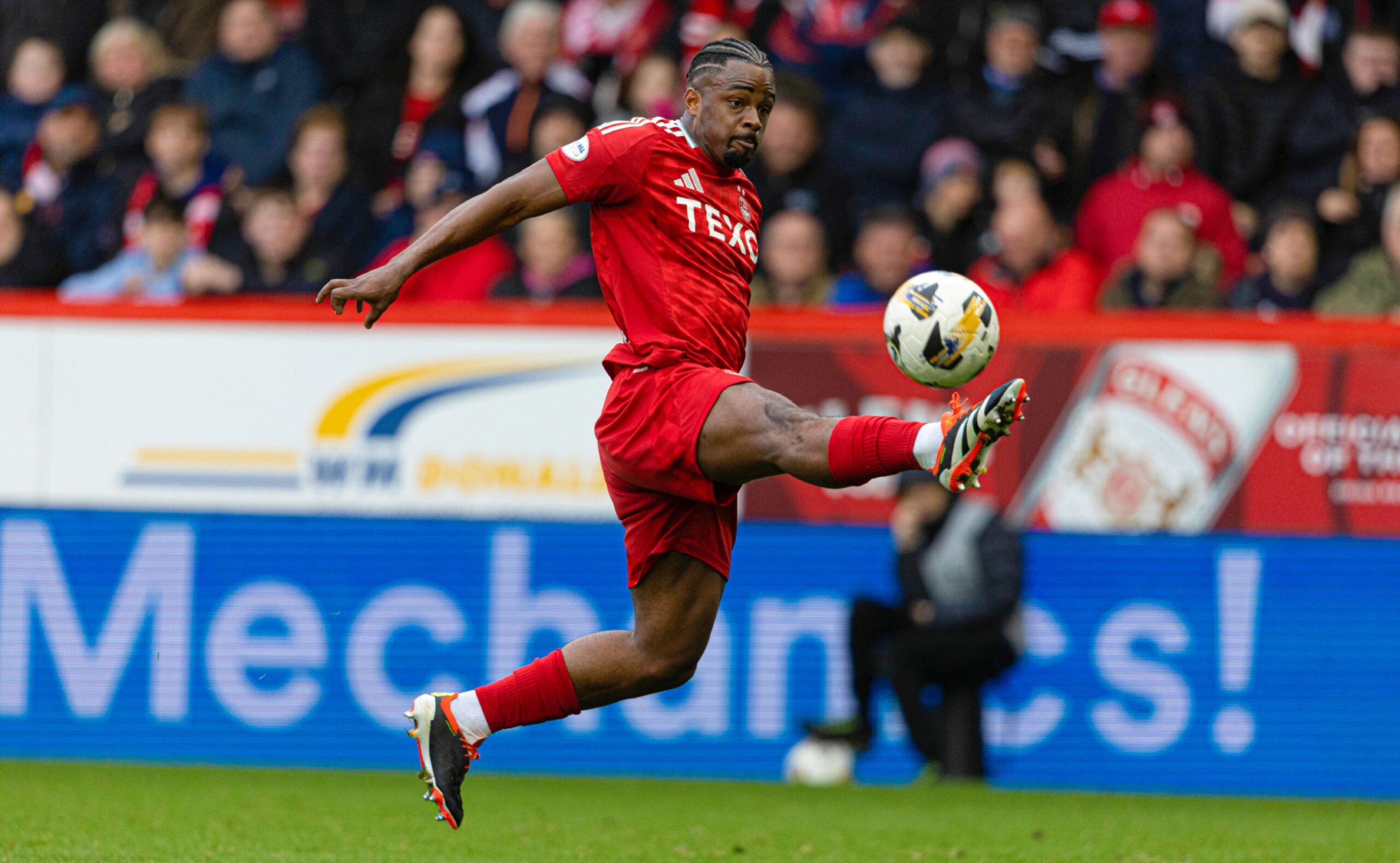 Aberdeen's Duk is introduced off the bench against Hearts. Image: SNS 