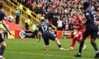 Aberdeen's Ante Palaversa scores to make it 3-2 against Hearts. Image: SNS