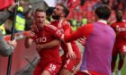 Aberdeen's Ante Palaversa celebrates scoring to make it 3-2 against Hearts at Pittodrie. Image: SNS