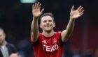 ABERDEEN, SCOTLAND - OCTOBER 06: Aberdeen's Nicky Devlin celebrates at full time during a William Hill Premiership match between Aberdeen and Heart of Midlothian at Pittodrie, on October 06, 2024, in Aberdeen, Scotland. (Photo by Mark Scates / SNS Group)