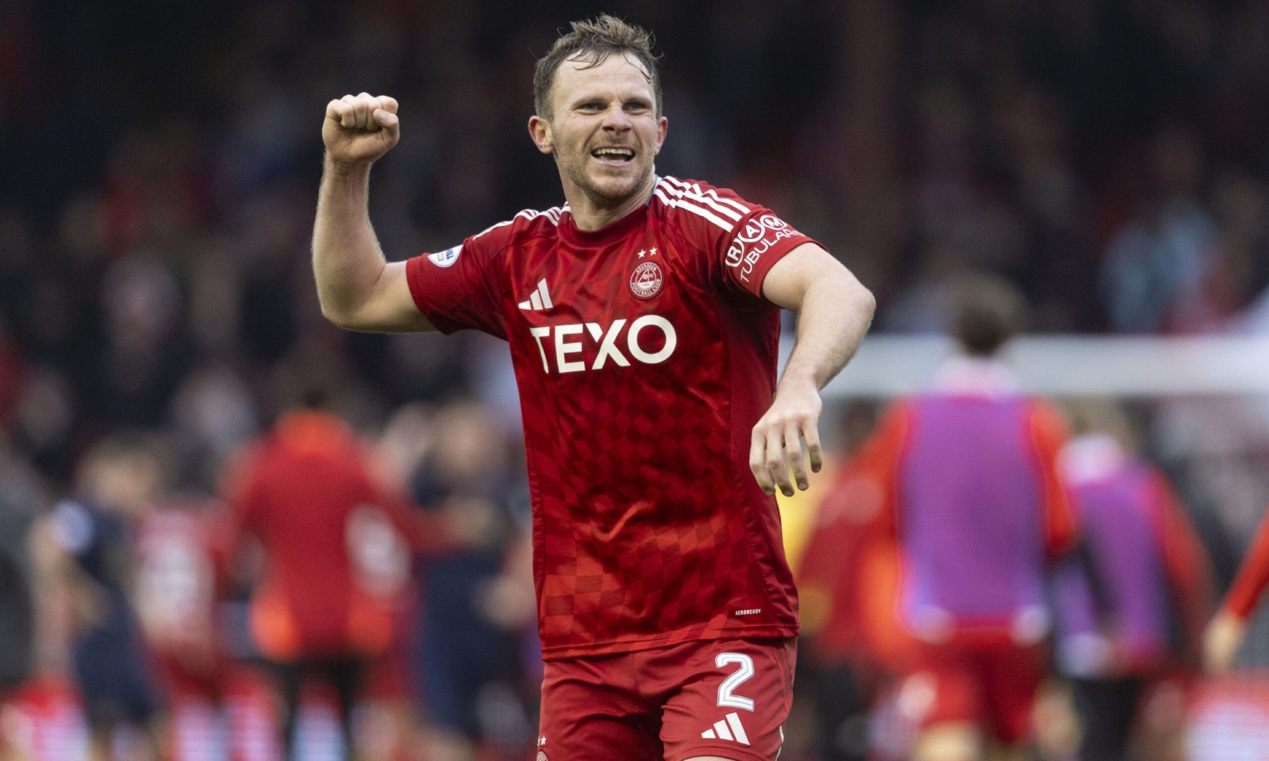 Aberdeen's Nicky Devlin celebrates during the 3-2 win against Hearts. Image: SNS