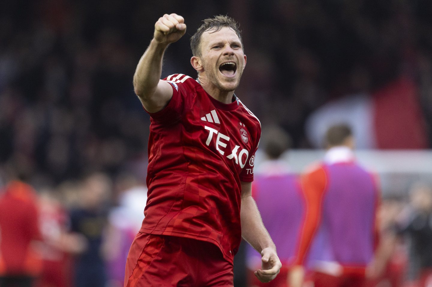 Aberdeen's Nicky Devlin celebrates during the 3-2 win against Hearts at Pittodrie. Image: SNS