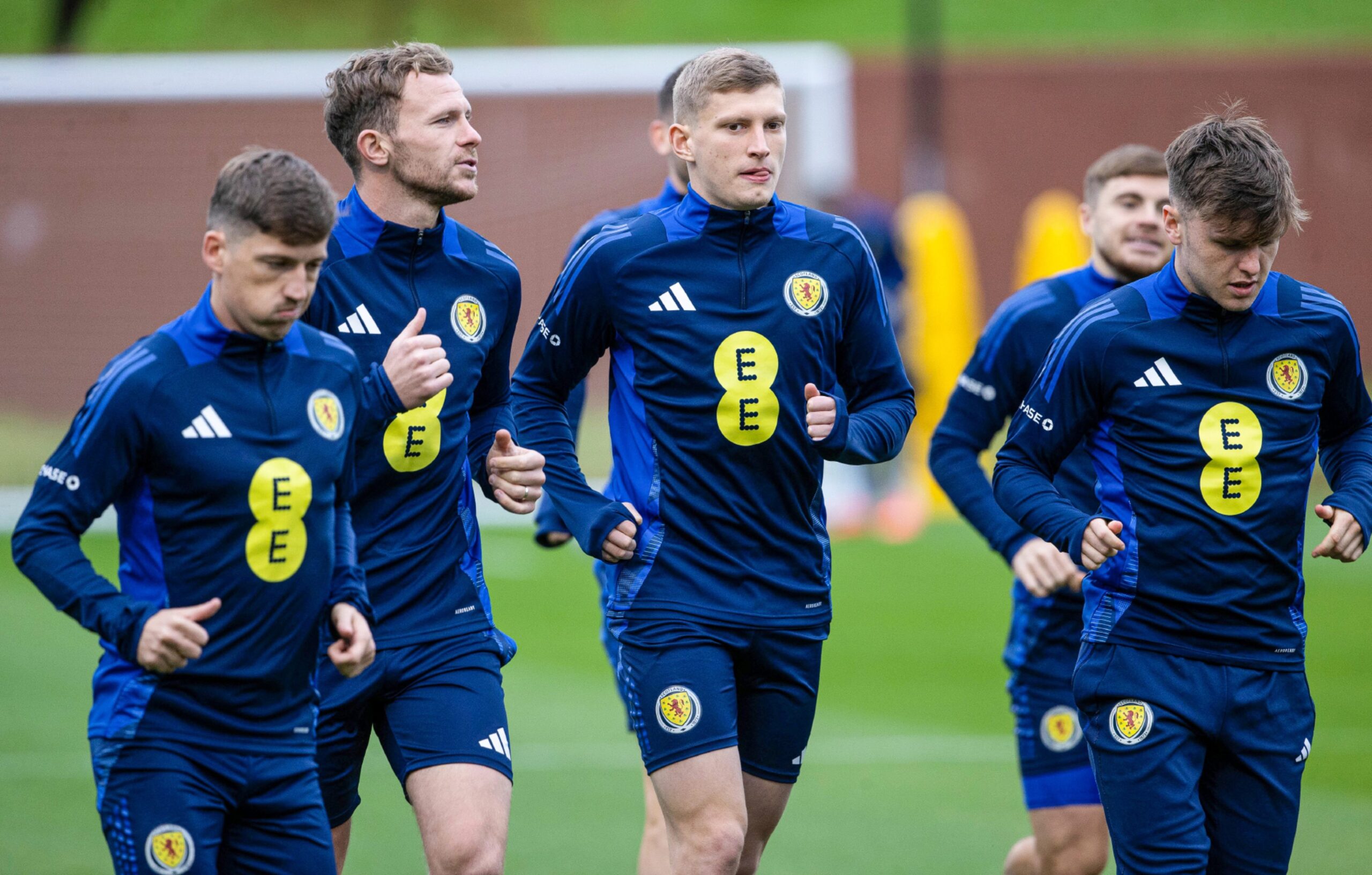 Aberdeen defenders Jack Mackenzie (R) and Nicky Devlin (L) during a Scotland training session at the City Stadium, Glasgow. Image: SNS 