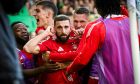 Aberdeen's Graeme Shinnie celebrates after scoring to make it 2-2 against Celtic. Image: SNS.