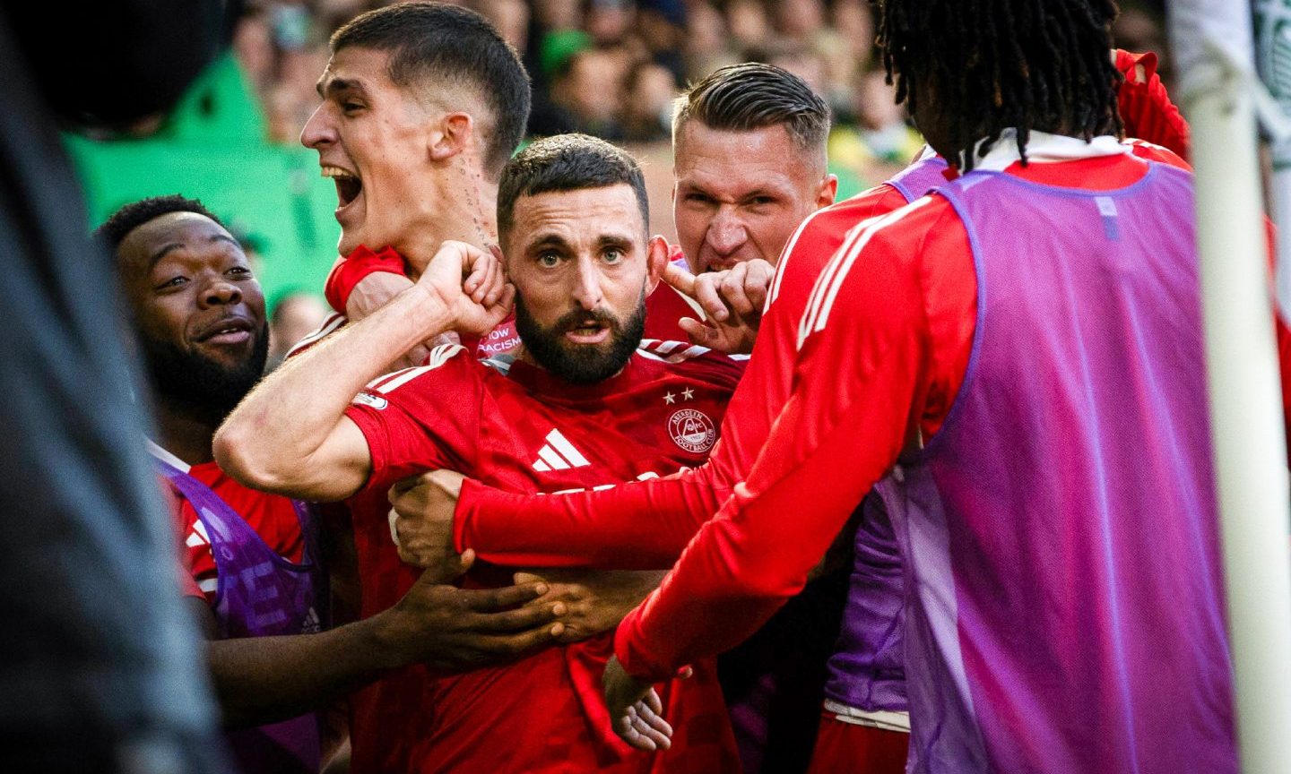 Aberdeen's Graeme Shinnie celebrates with the other players