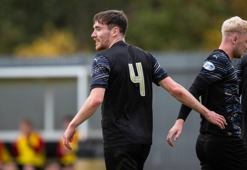 Jake Davidson celebrates his goal against Dumbarton with Luis Longstaff. 