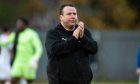 New Inverness head coach Scott Kellacher applauds the ICT fans after Saturday's 3-1 defeat at Dumbarton. Image: SNS.