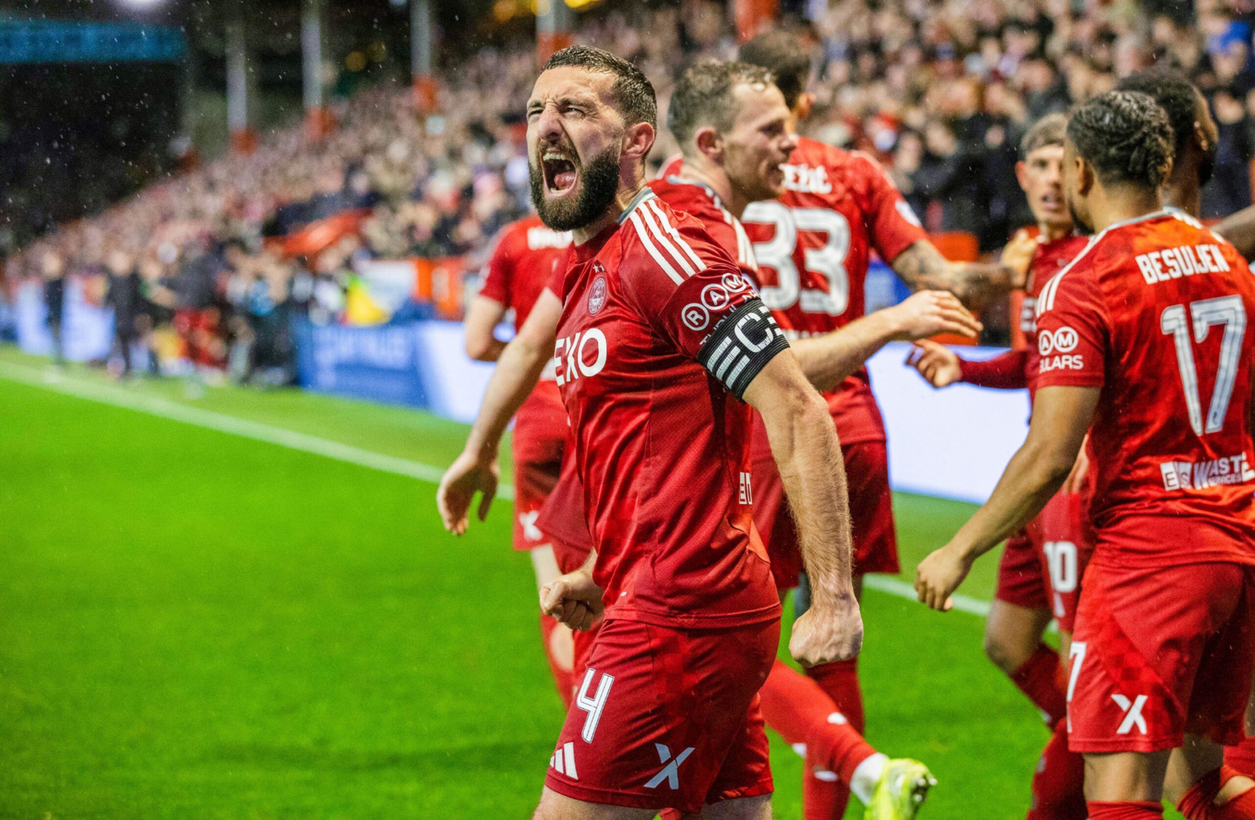 Aberdeen's Graeme Shinnie celebrates after Peter Ambrose scores to make it 1-0 against Dundee United. Image: SNS 