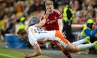 Aberdeen's Gavin Molloy and Dundee United's Sam Dalby in action during the 1-0 win at Pittodrie. Image: SNS