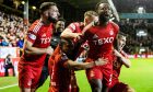 Aberdeen's Shayden Morris celebrates scoring to make it 2-1 with his teammates. Image: SNS.