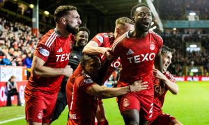 Aberdeen's Shayden Morris celebrates scoring to make it 2-1 against Rangers with his teammates. Image: SNS