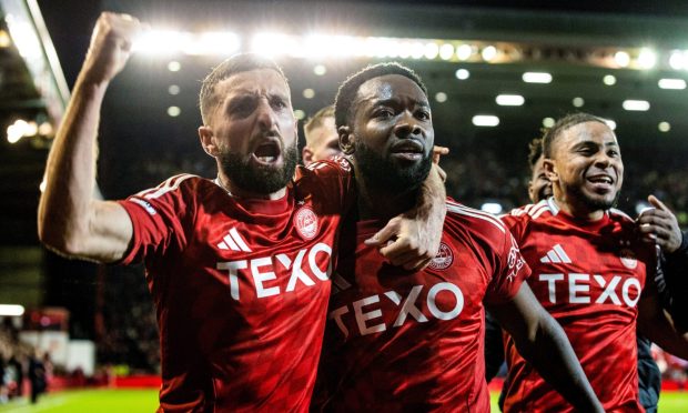 Shayden Morris celebrates with captain Graeme Shinnie after scoring Aberdeen's second goal. Image: SNS