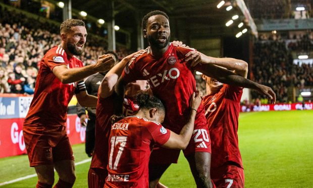 Aberdeen's Shayden Morris celebrates as he scores to make it 2-1 against Rangers at a capacity Pittodrie. Image: SNS