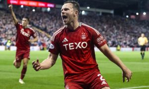 Aberdeen's Nicky Devlin celebrates scoring to make it 1-0 against Rangers. Image: SNS.