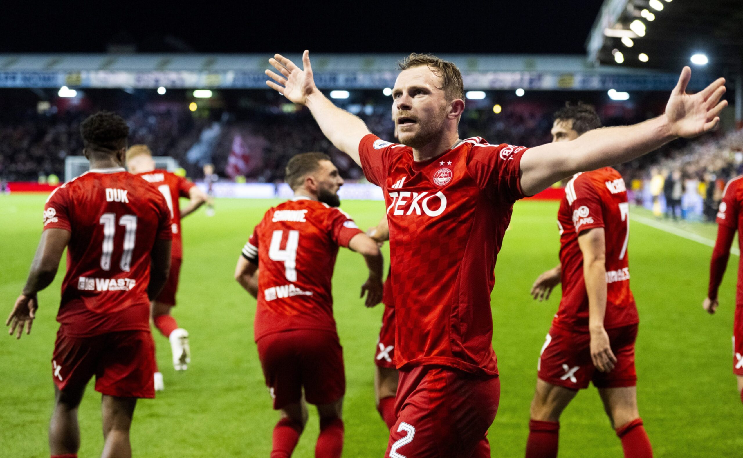 Aberdeen's Nicky Devlin celebrates scoring to make it 1-0 against Rangers at Pittodrie. Image: SNS 