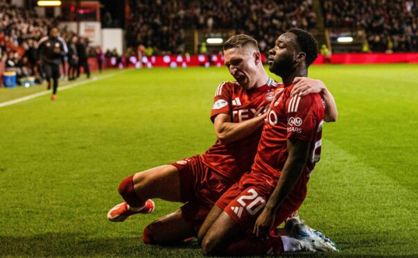 Aberdeen's Shayden Morris celebrates scoring to make it 2-1 with Ante Palaversa against Rangers. Image: SNS