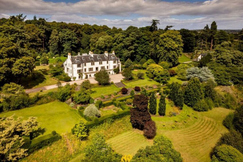 Allangrange mansion looks out over a stunning and well-kept garden.