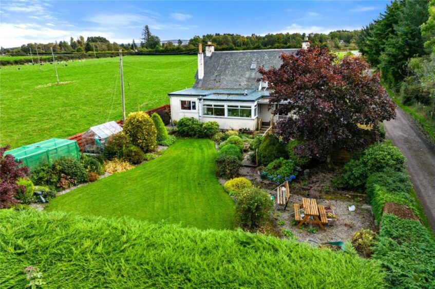 the property enjoys a large back garden