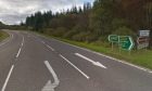 Road signs and road markings on A82