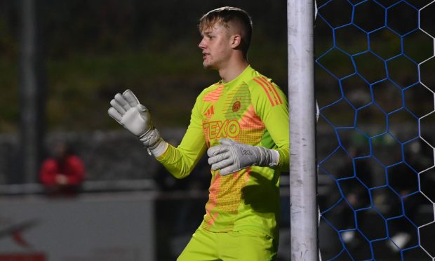 Banks o' Dee v Aberdeen B at Spain Park in the semi-final of the Evening Express Aberdeenshire Cup on Wednesday October 2 2024. Aberdeen goalkeeper Rodrigo Vitols marshalling his defence. Image: Darrell Benns/DC Thomson.