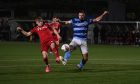 Banks o' Dee captain Kane Winton, right, and Aberdeen's Alfie Stewart in action during Wednesday's Evening Express Aberdeenshire Cup semi-final. Picture by Darrell Benns/DCT Media.