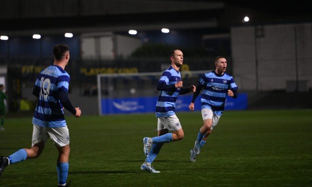 Huntly's Callum Murray, right pictured in action for former club Buckie Thistle, is hoping the Black and Golds can progress in the Aberdeenshire Shield.