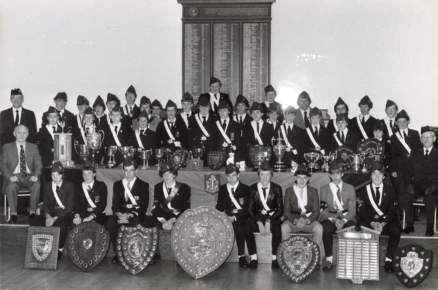 Image shows the members of Aberdeen Battalion Boys' Brigade standing next to a table, surrounded by awards