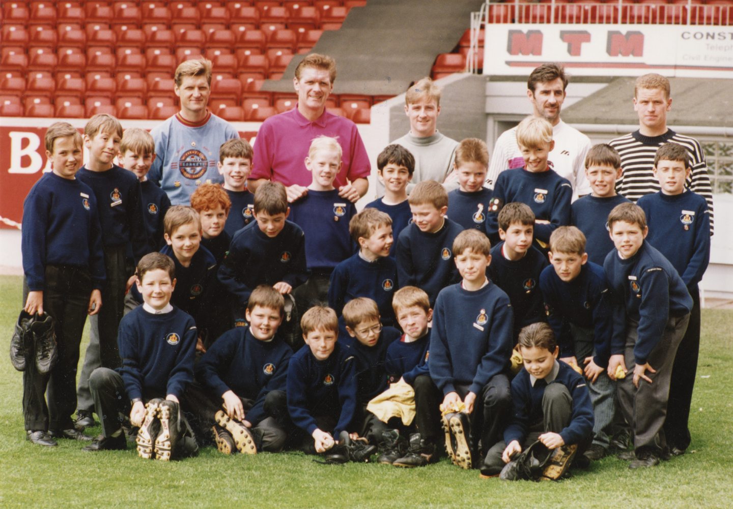 Members of the Aberdeen Battalion Junior Section Boys' Brigade 75th Anniversary at Pittodrie with player-coach Neil Cooper, co-assistant manager Roy Aitken and players Stewart McKimmie, Robert Connor and Andy Gibson.