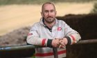 Duncan Maclennan at the farm he works on near Ellon. The 29-year-old is on the path to recovery after a suicide attempt two years ago. Image: Darrell Benns/DC Thomson