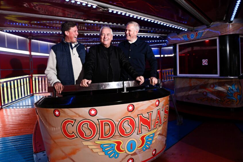 Jack, Alan and John Codona on the Waltzer, as they share their family story. Image: Darrell Benns/DC Thomson