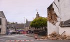 Debris still remains on the Oldmeldrum road. Image: Darrell Benns/DC Thomson.