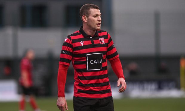 Jay Halliday, right, celebrates after scoring for Inverurie Locos against Dundee North End in the Scottish Cup. Pictures by Kath Flannery/DCT Media.