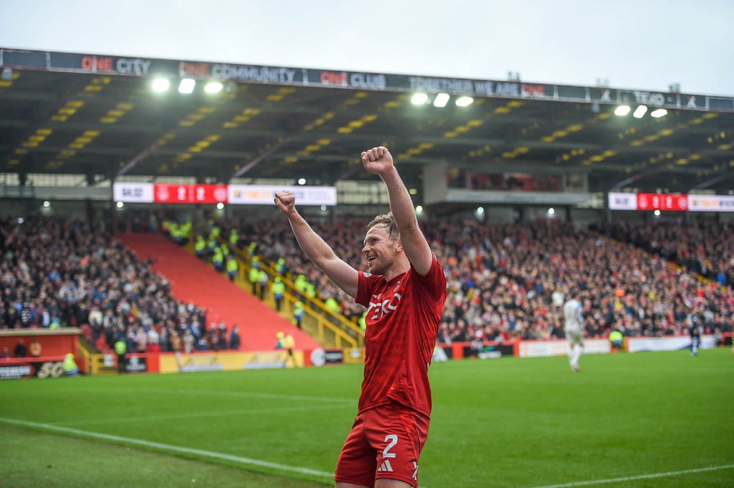 Aberdeen's Nicky Devlin celebrating after scoring in the 3-2 win against Hearts. Image: SNS