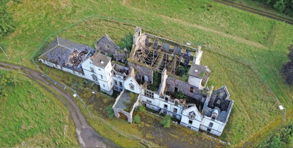 Aerial shot of fire ravaged Dunain House.