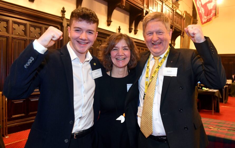 Audrey Nicoll celebrates her election to Aberdeen City Council for the SNP, alongside husband Alex and their son Sam. Image: Chris Sumner/DC Thomson