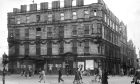 The Palace Hotel at the Union Street/Bridge Street Junction in Aberdeen after it was gutted by a fire in 1941, pictured here in October 1945. Image: DC Thomson