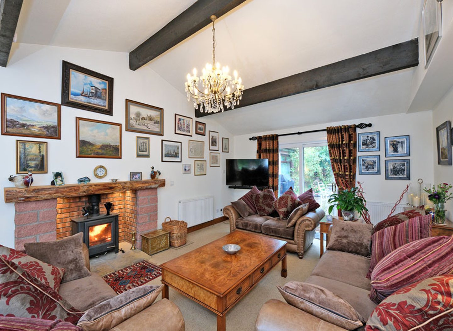 Spacious lounge area inside the home for sale in Aboyne