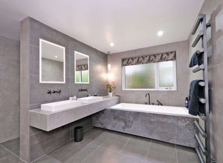 Spacious and modern bathroom at the home for sale in Aboyne