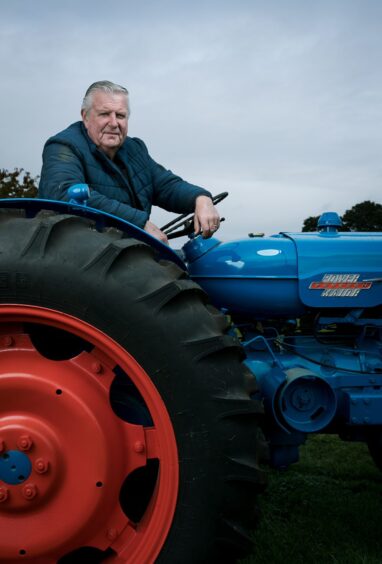 Hamish Fraser with the 1959 Fordson Power Major tractor he brought back to its former glory. 