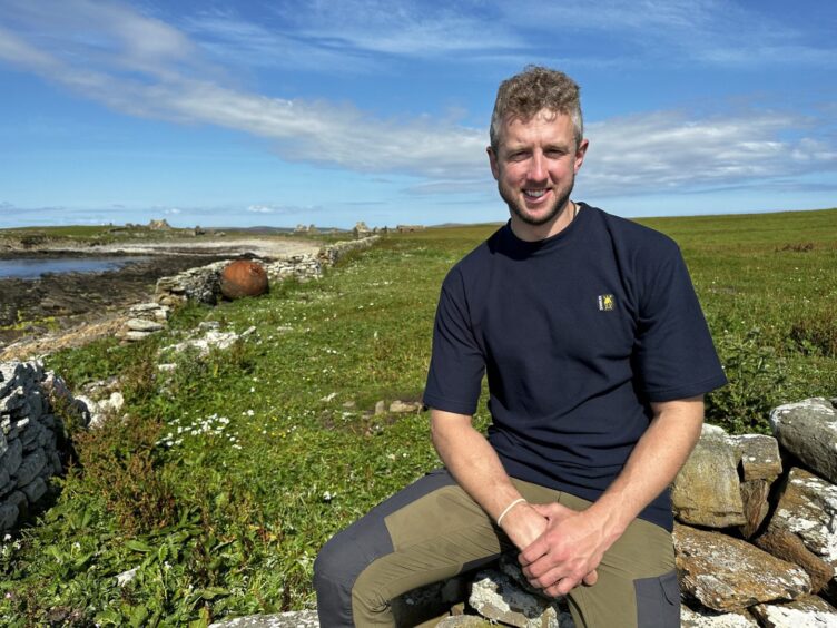 Cammy on Swona, finding out about wild cattle.