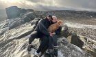 Chloe Grigby and her partner Erem, with dog Macy at the top of a mountain. All images: Chloe Grigby