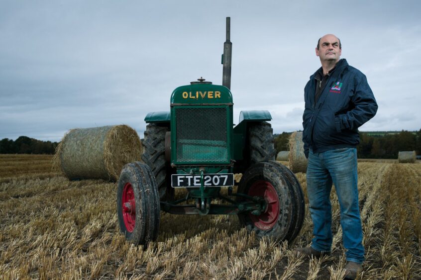 Iain MacRae and his 1942 Oliver 80.