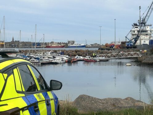 Police at Peterhead Bay Marina. Image: Isaac Buchan/ DC Thomson