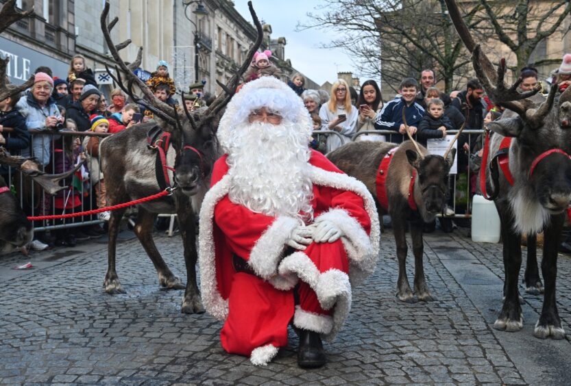 Santa and his reindeer at Elgin Christmas lights switch on