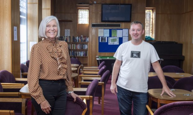 Gwen Jones and William Stewart inside Ex Servicemen's Club bar.