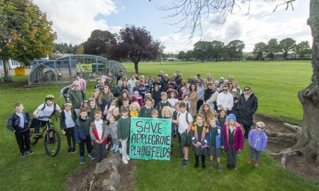 Dozens of parents and children are protesting the construction of the new Forres Academy on the Roysvale site. Image: Jason Hedges/DC Thomson.