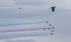 Crowds were wowed by the Red Arrows magnificent display over Lossiemouth. Image: Jason Hedges.