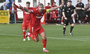 Jordan MacRae celebrates scoring Brora Rangers' fourth goal against Buckie Thistle. Pictures by Jason Hedges/DCT Media.