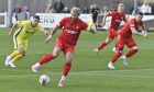 Jordan MacRae of Brora Rangers on the ball against Buckie Thistle. Pictures by Jason Hedges/DCT Media.